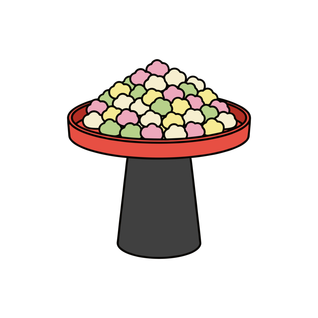 ひな祭りに使えるかわいいひなあられのイラスト。三色のあられが盛られた背景透過PNG素材