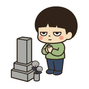 お墓参りで手を合わせる子ども