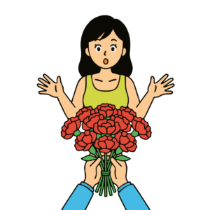 花束をもらって驚く女性